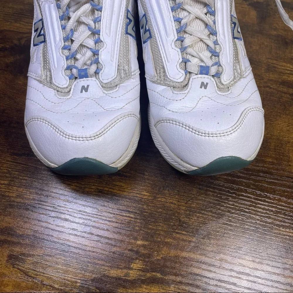 New Balance White Athletic Sneakers with Blue Accents